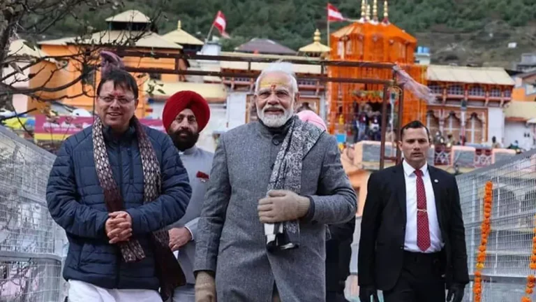 06_03_2025-pm-modi-cm-dhami_23895426